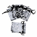 Organza zakje 7 x 9 cm zilver hartje op zwart zakje