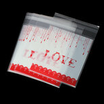 10 cellofaan zakjes met plakstrip Love