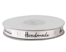 Satijn lint 1 cm ivoor met &ldquo;handmade&rdquo; tekst 4 meter