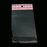 Cellofaan zakjes 9 x 16 cm blokjes en bloemetje en kersjes MET OPHANGOOG 10 stuks Cellofaan zakjes 9 x 16 cm blokjes en bloemetje en kersjes MET OPHANGOOG 10 stuks